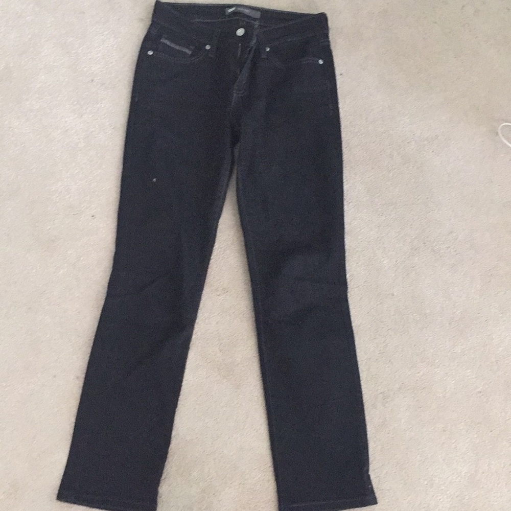 Levi black mid rise skinny jeans.